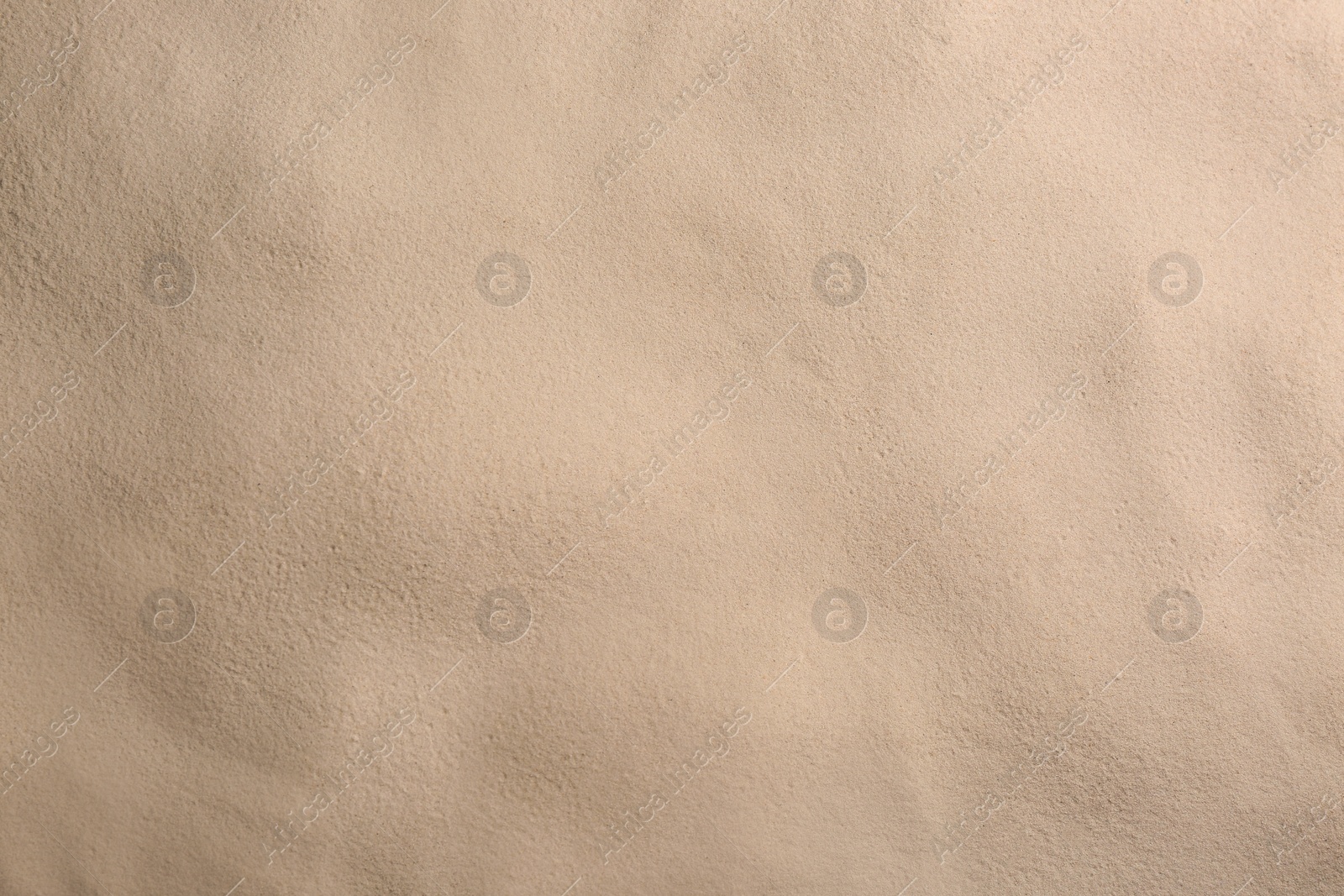 Photo of Dry beach sand as background, top view