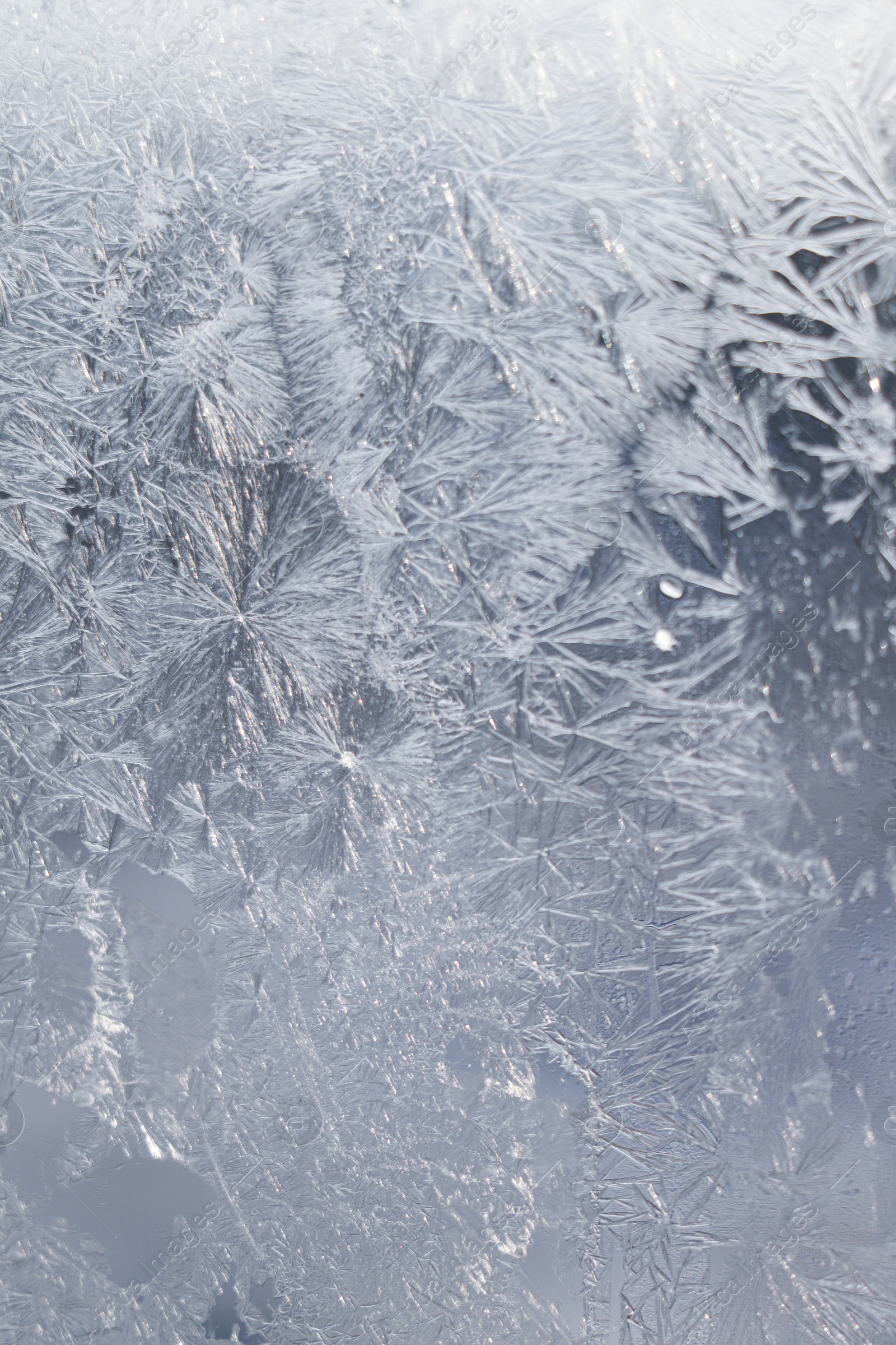Photo of Beautiful frosty window as background, closeup. Winter morning
