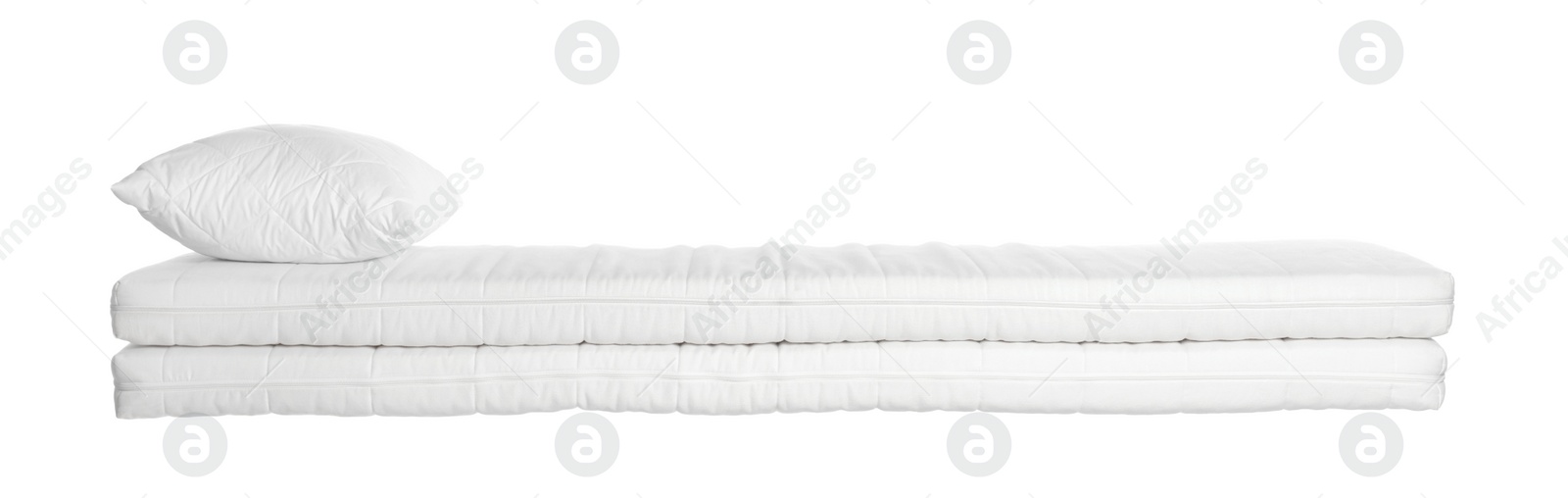 Photo of Two new comfortable mattresses with pillow isolated on white