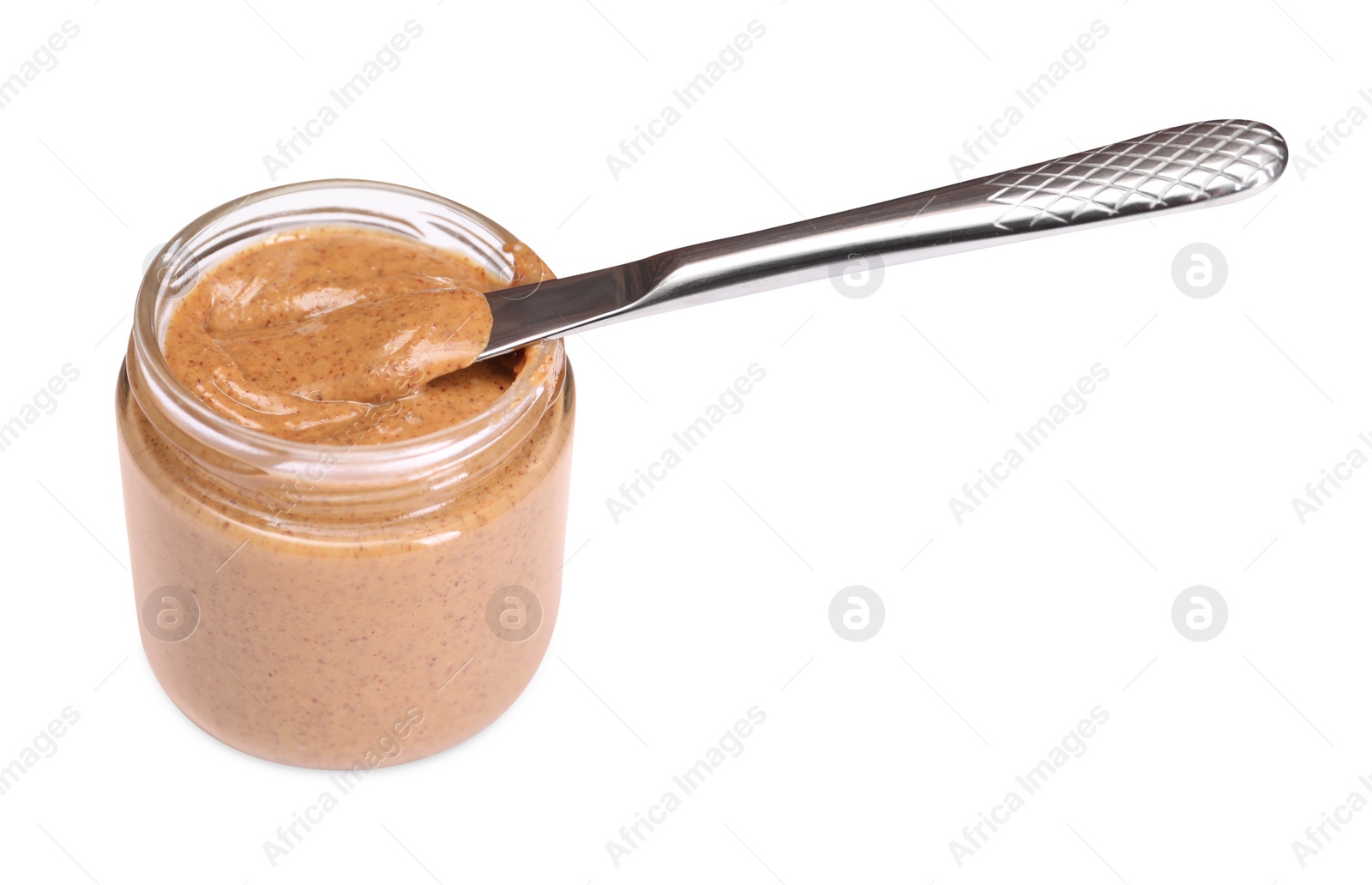 Photo of Tasty nut paste in jar and knife isolated on white