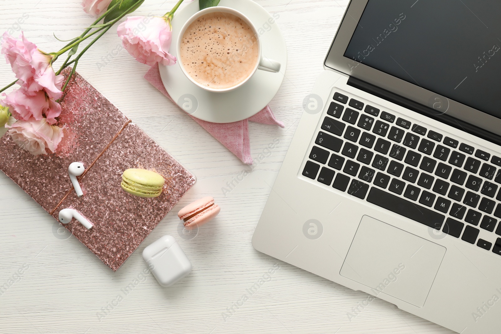 Photo of Flat lay composition with laptop on white wooden table. Fashion blogger