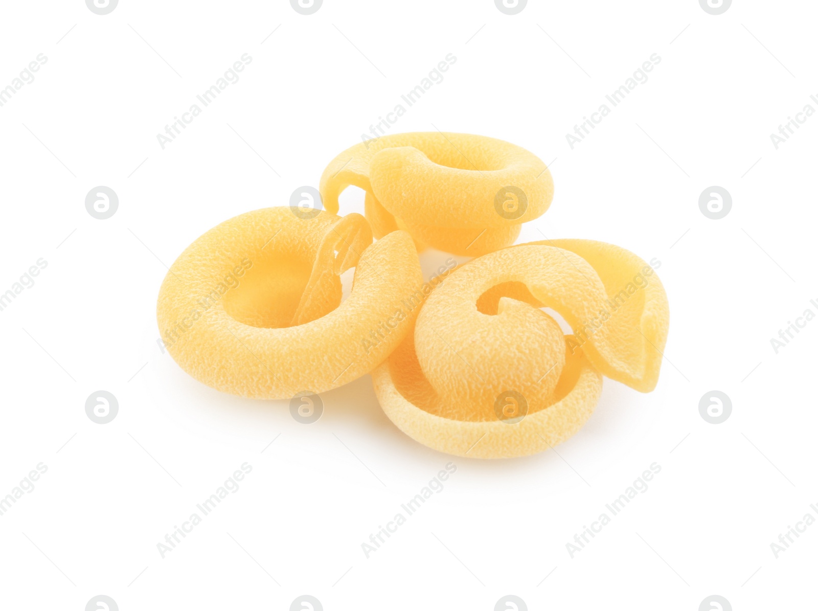 Photo of Raw dischi volanti pasta isolated on white