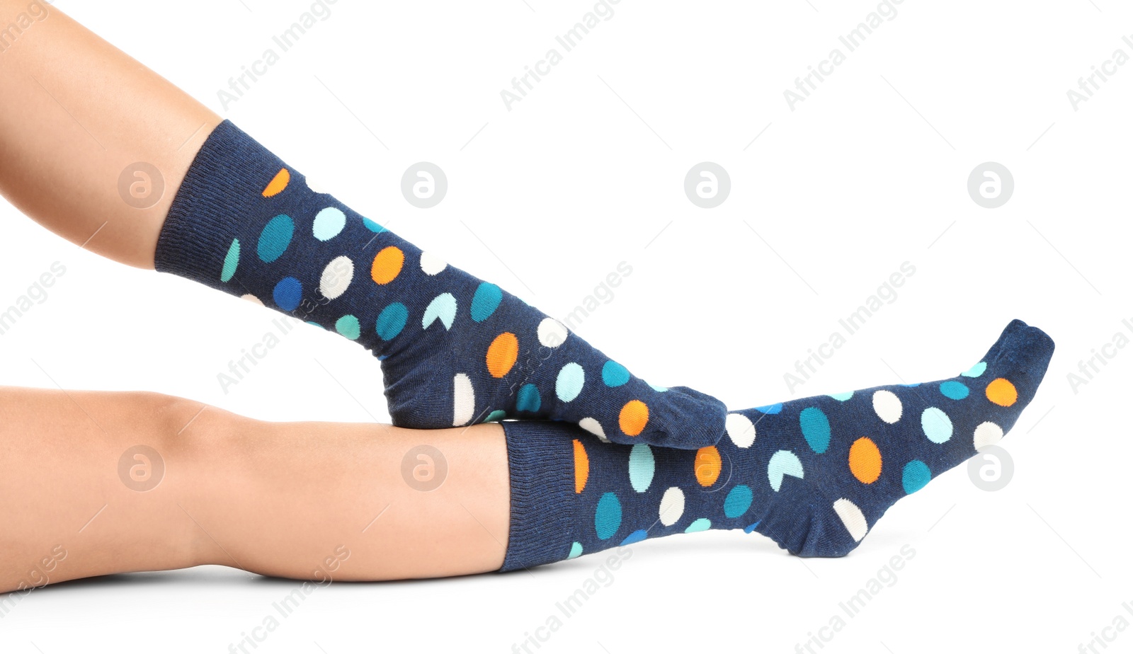 Photo of Woman in stylish socks on white background, closeup