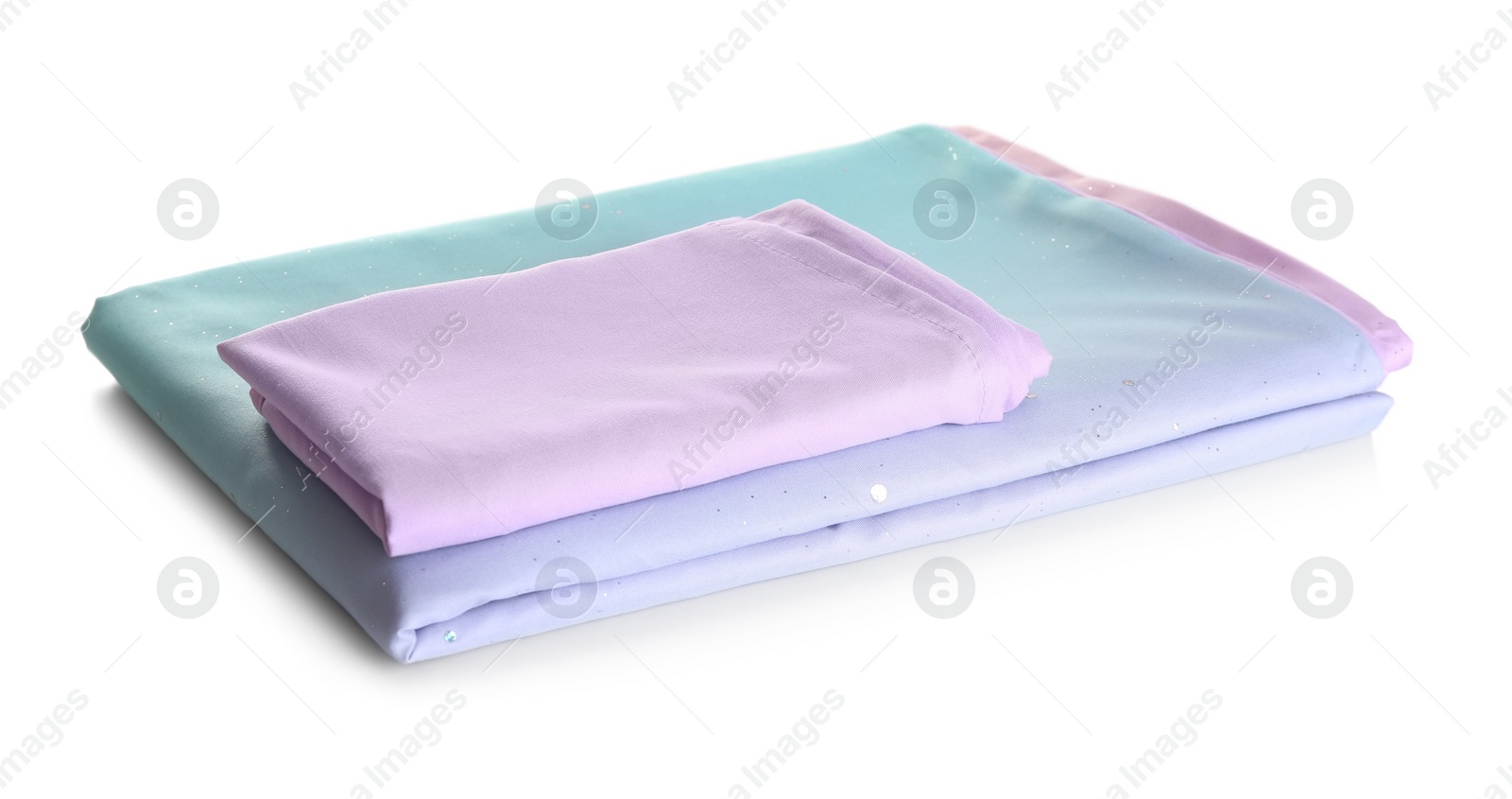 Photo of Stack of clean bed sheets isolated on white