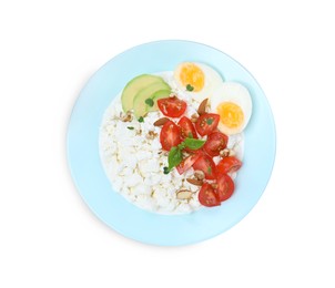 Photo of Plate of fresh cottage cheese with vegetables and egg isolated on white, top view