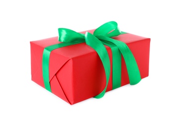 Christmas gift box decorated with ribbon bow on white background