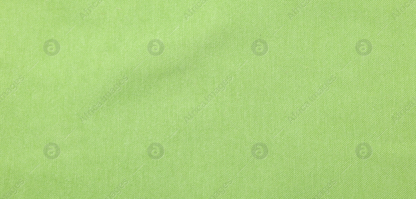 Photo of Texture of light green fabric as background, top view