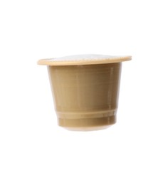 Photo of One plastic coffee capsule isolated on white