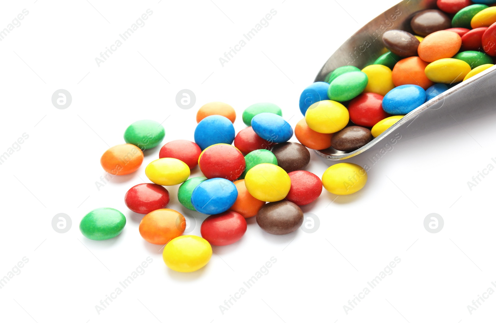 Photo of Scoop and colorful candies on white background