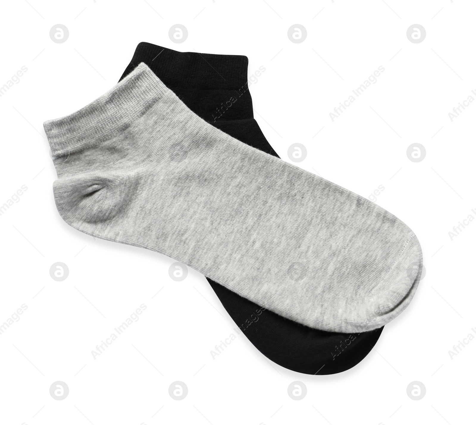 Photo of Different socks isolated on white, top view