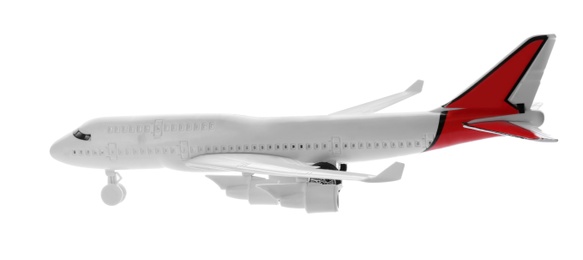 Toy airplane isolated on white. Travel concept