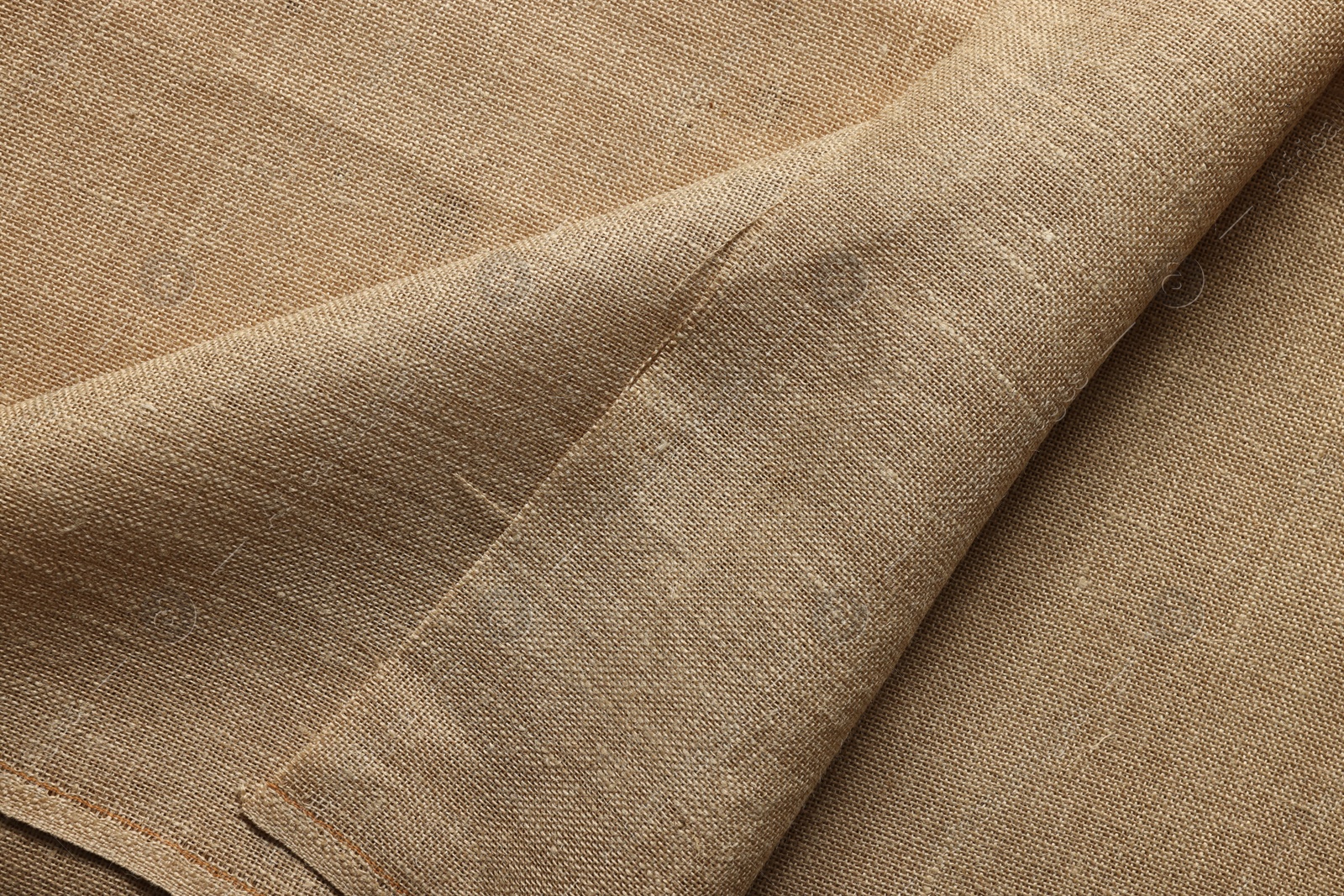 Photo of Texture of burlap fabric as background, top view