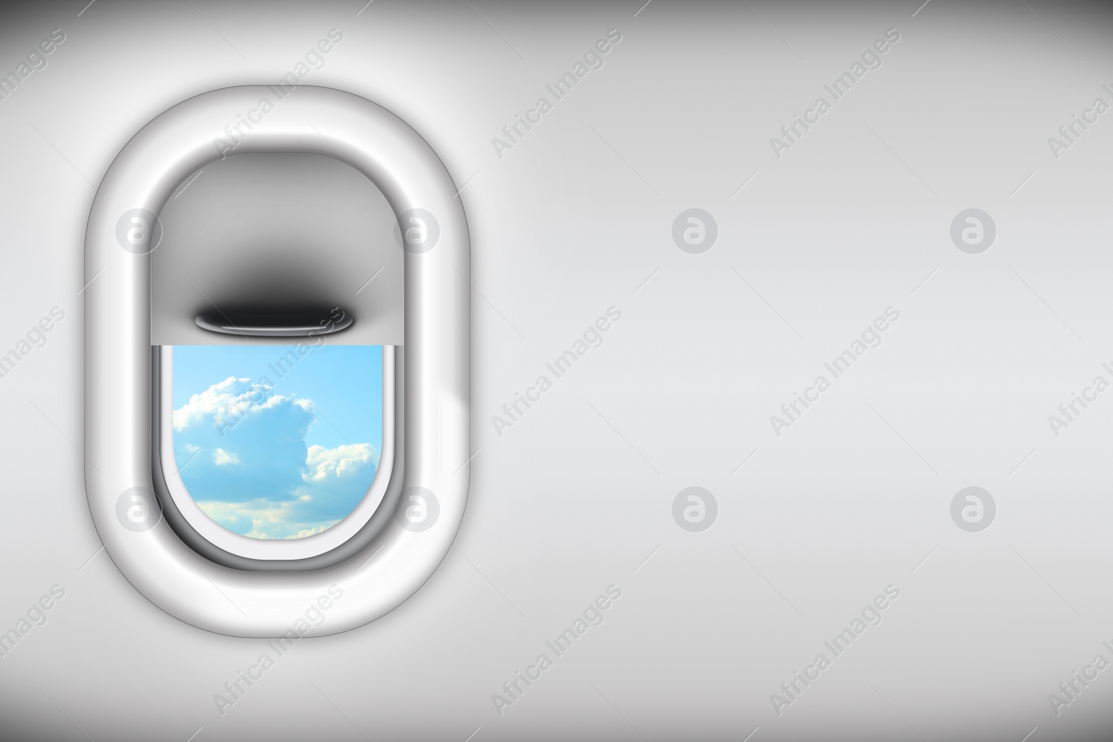 Image of View on blue sky with clouds through open airplane porthole, space for text