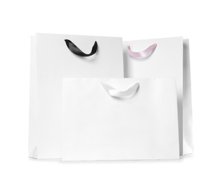 Paper shopping bags isolated on white. Mock up for design