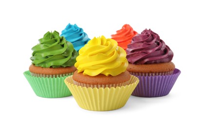 Different delicious colorful cupcakes on white background