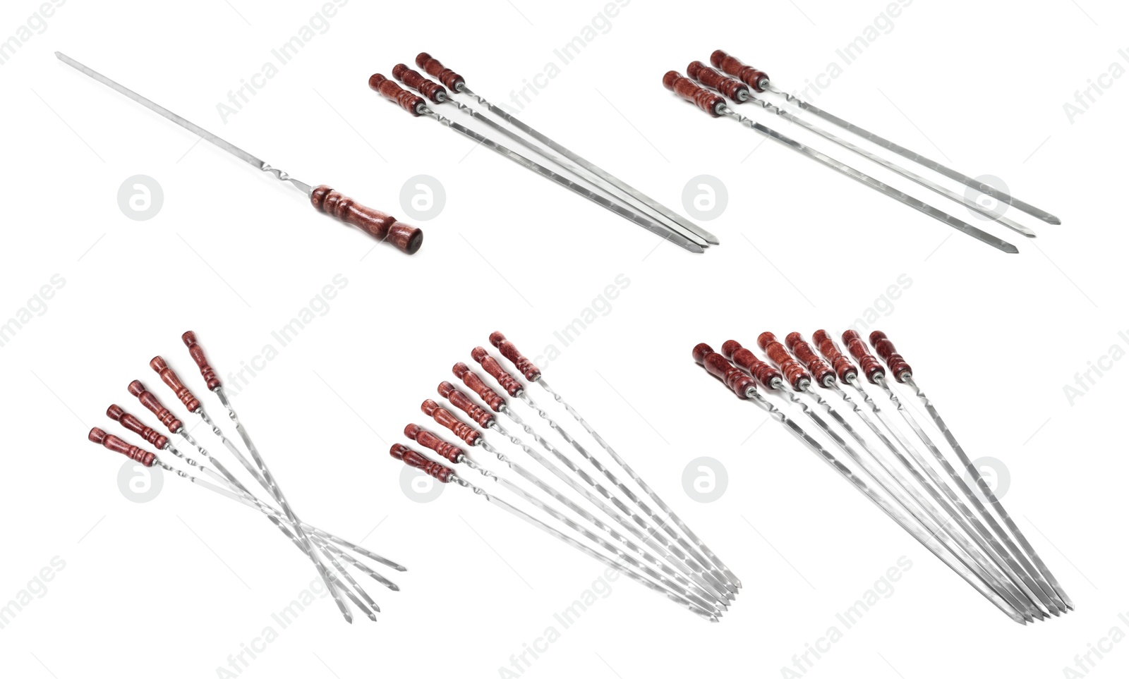 Image of Set with metal skewers on white background 