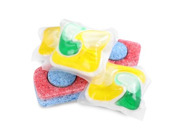 Photo of Dishwasher detergent pods and tablets on white background