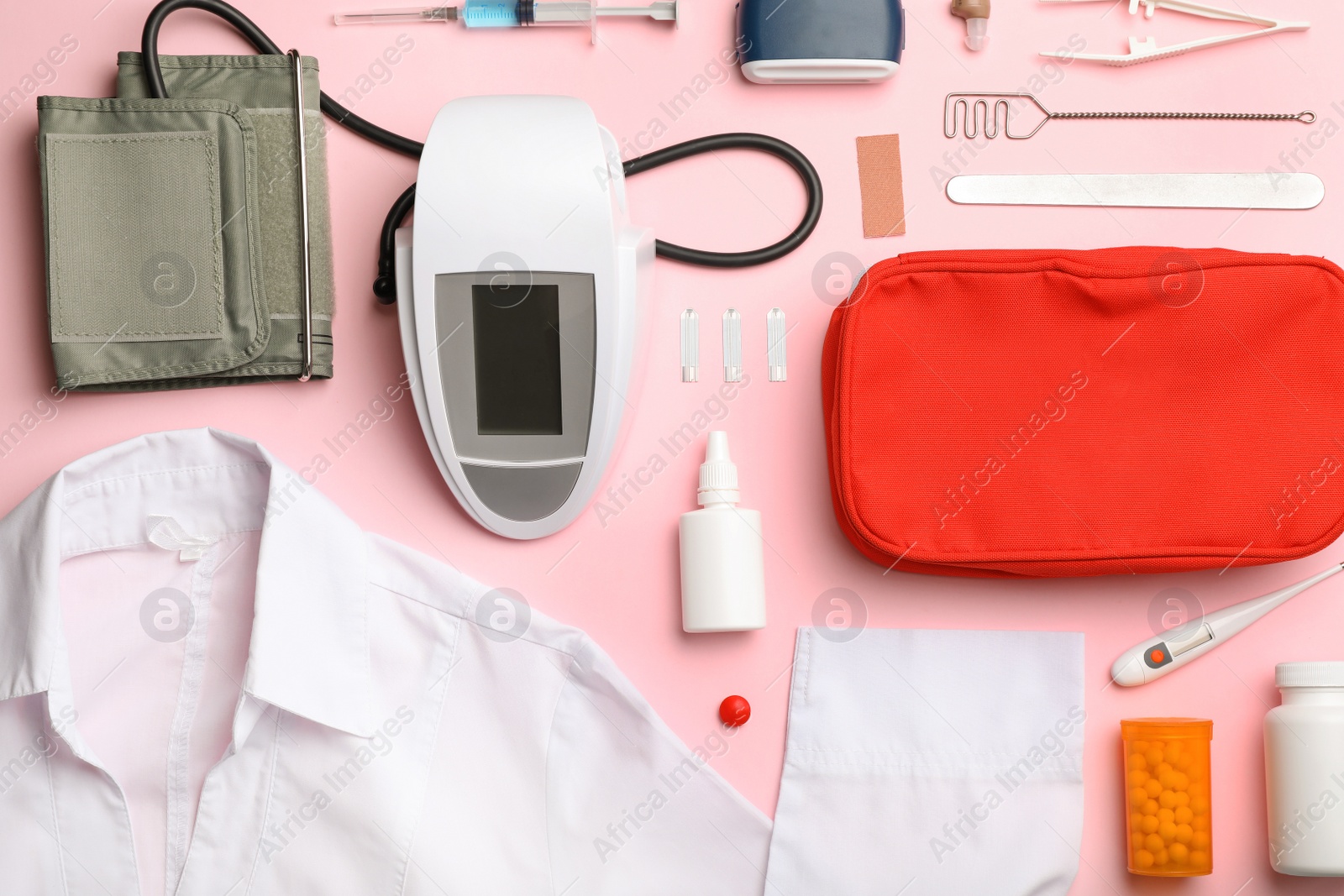 Photo of Flat lay composition with medical objects on color background