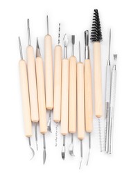 Set of different clay crafting tools isolated on white, top view