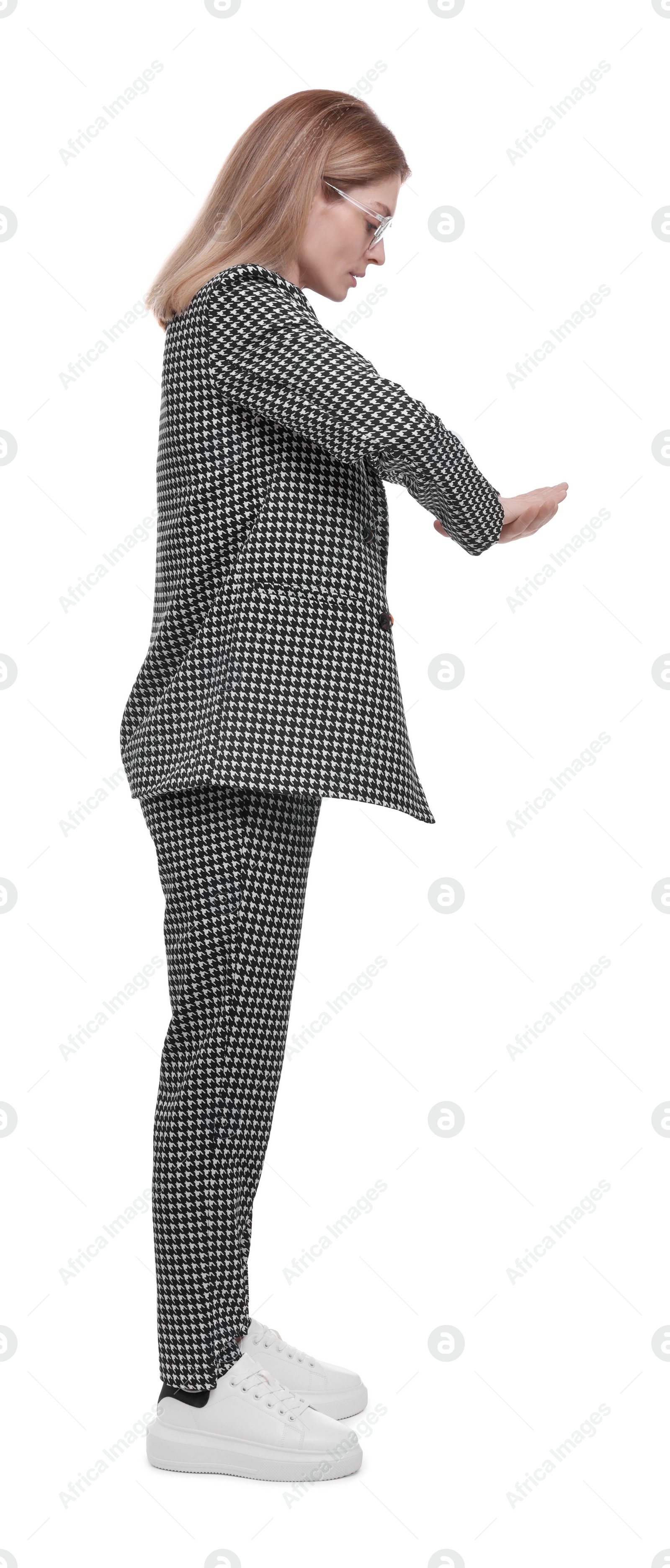 Photo of Beautiful businesswoman in suit posing on white background