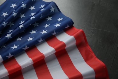 Photo of Flag of USA on black table, closeup