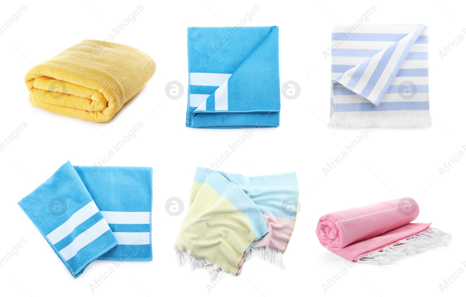 Image of Set with different soft towels on white background 