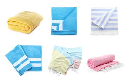 Image of Set with different soft towels on white background 