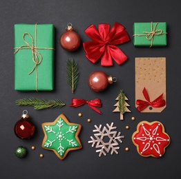 Photo of Flat lay composition with Christmas decor on black background