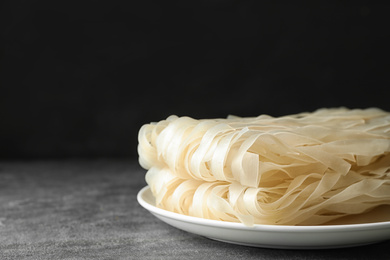 Photo of Block of rice noodles on grey table