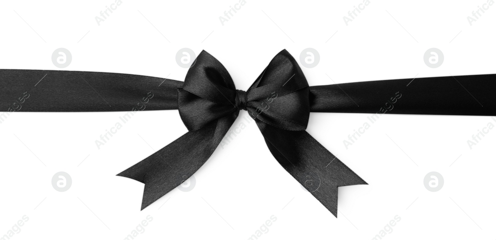 Photo of Black satin ribbon with bow isolated on white, top view