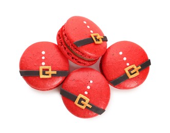 Photo of Beautifully decorated Christmas macarons on white background, top view