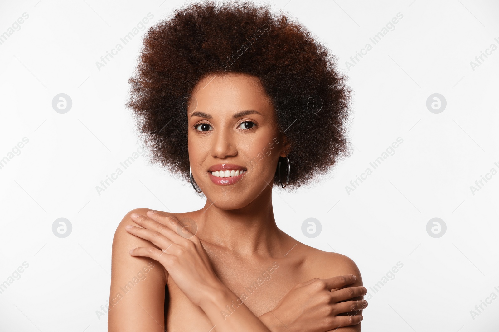 Photo of Portrait of beautiful young woman with glamorous makeup on white background