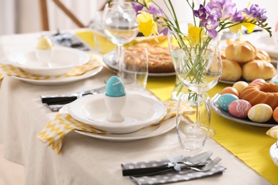 Festive Easter table setting with traditional meal