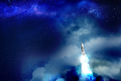 Image of Launched rocket in flight, night starry sky background. Space mission