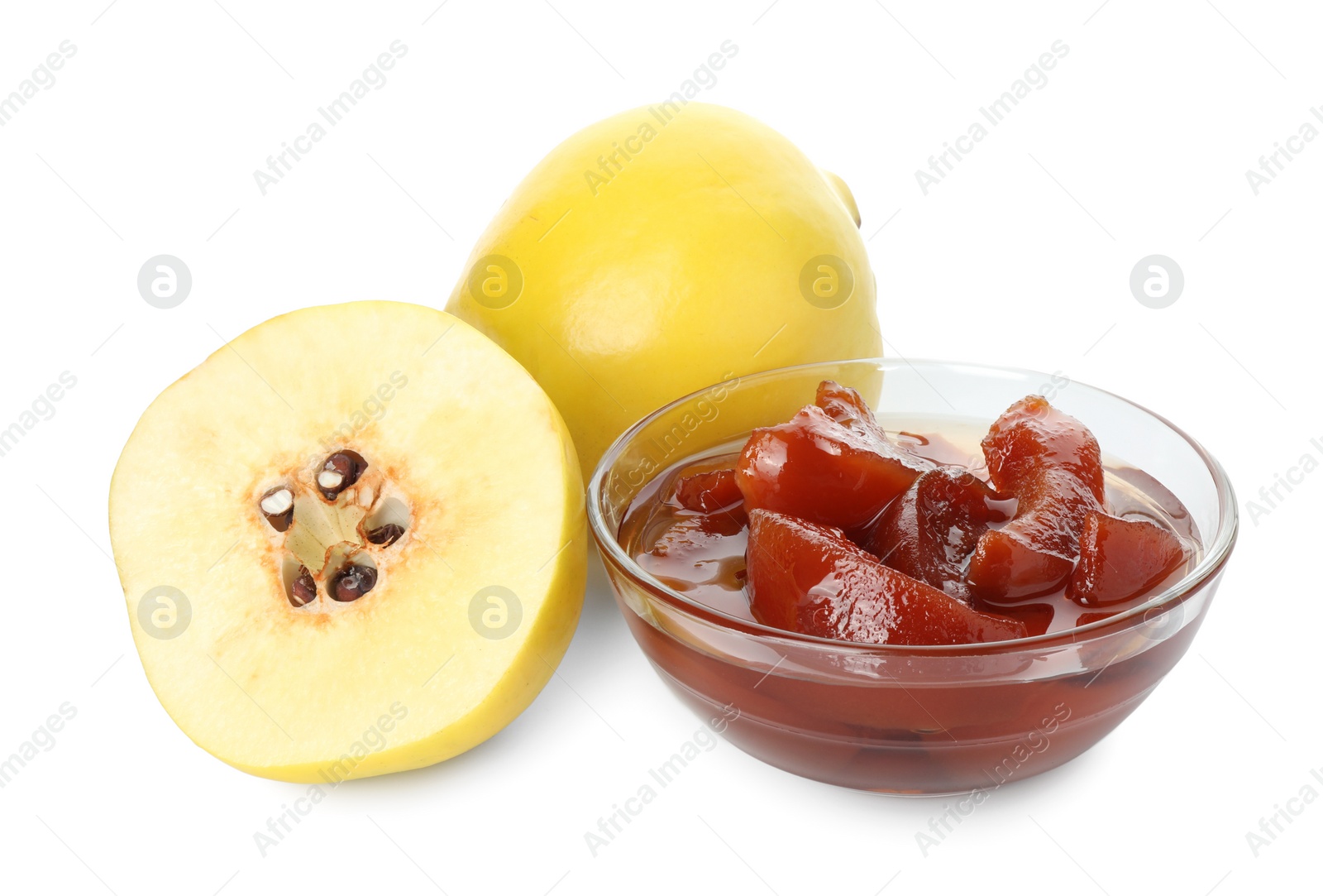 Photo of Tasty homemade quince jam in bowl and fruits isolated on white