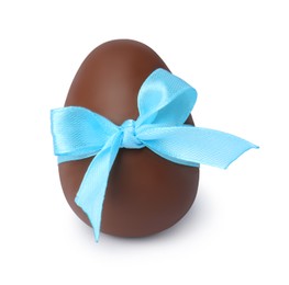 Photo of One tasty chocolate egg with light blue ribbon isolated on white