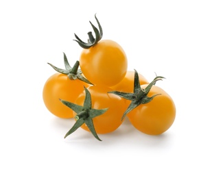 Photo of Ripe yellow cherry tomatoes on white background