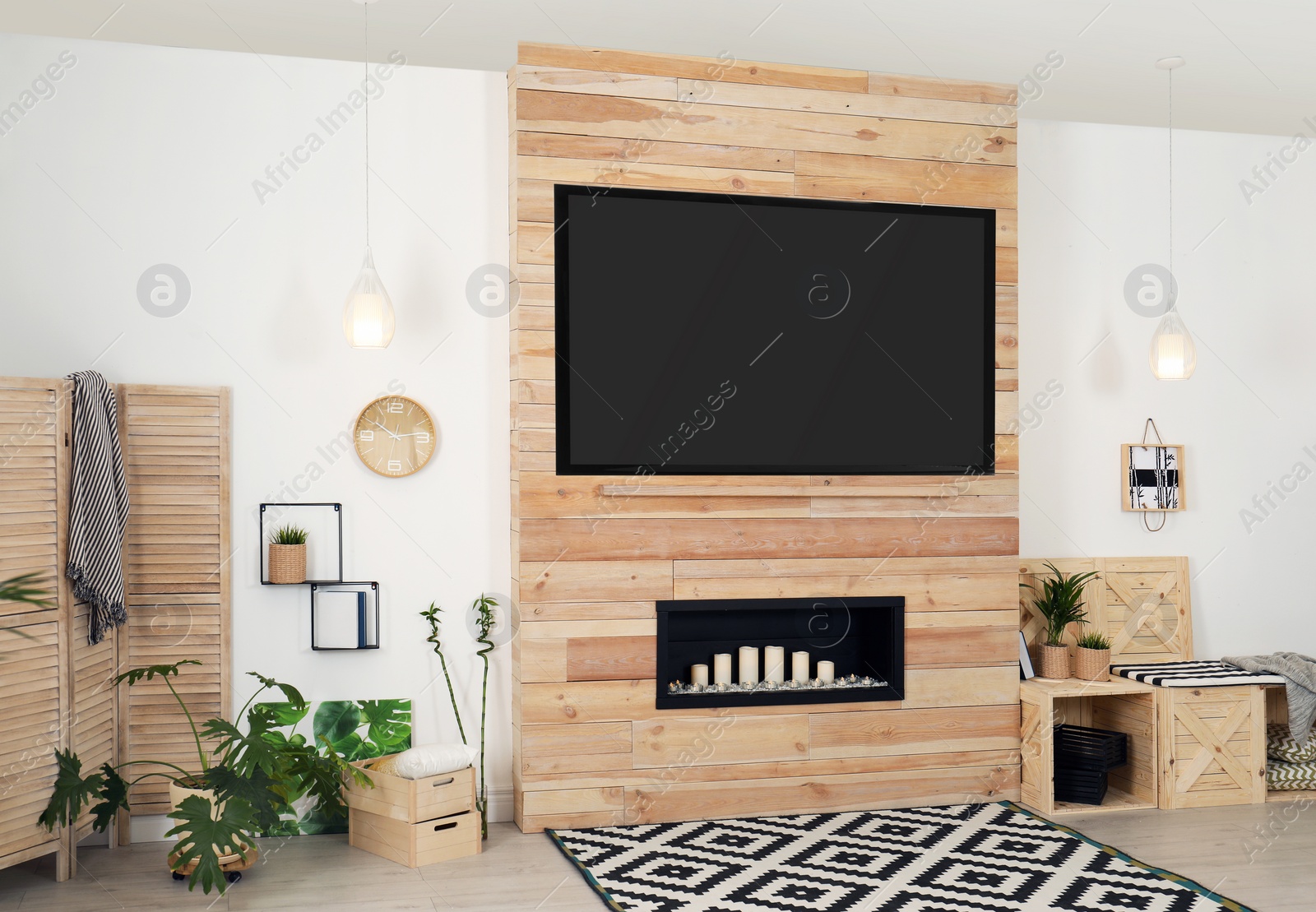 Photo of Living room interior with modern TV on wooden wall