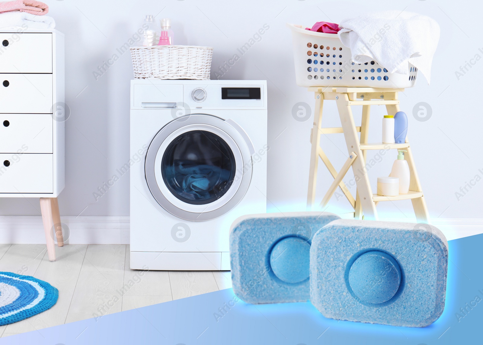 Image of  water softener tablets and modern washing machine in laundry room