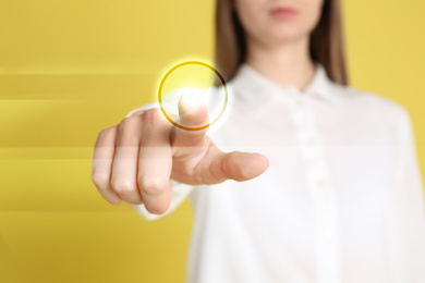 Image of Woman pressing button on virtual screen, closeup