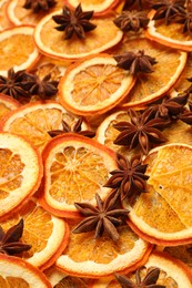 Dry orange slices and anise stars as background, closeup