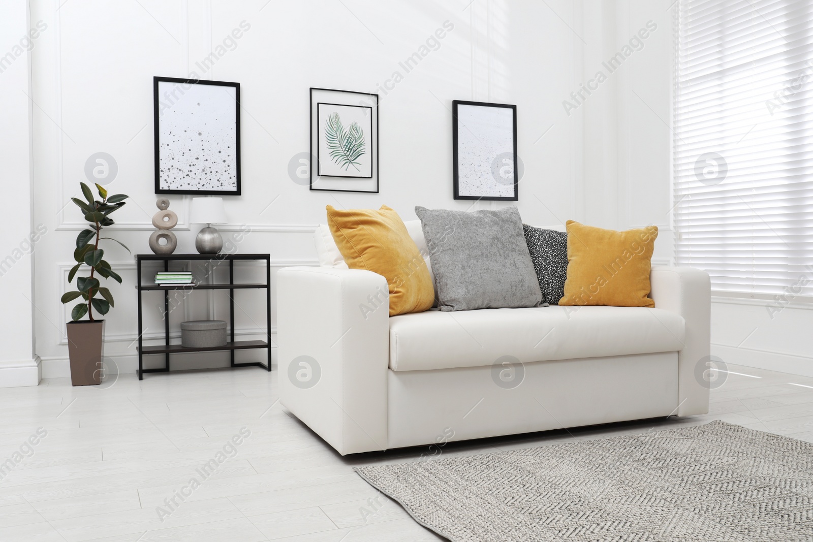 Photo of Stylish living room interior with comfortable sofa