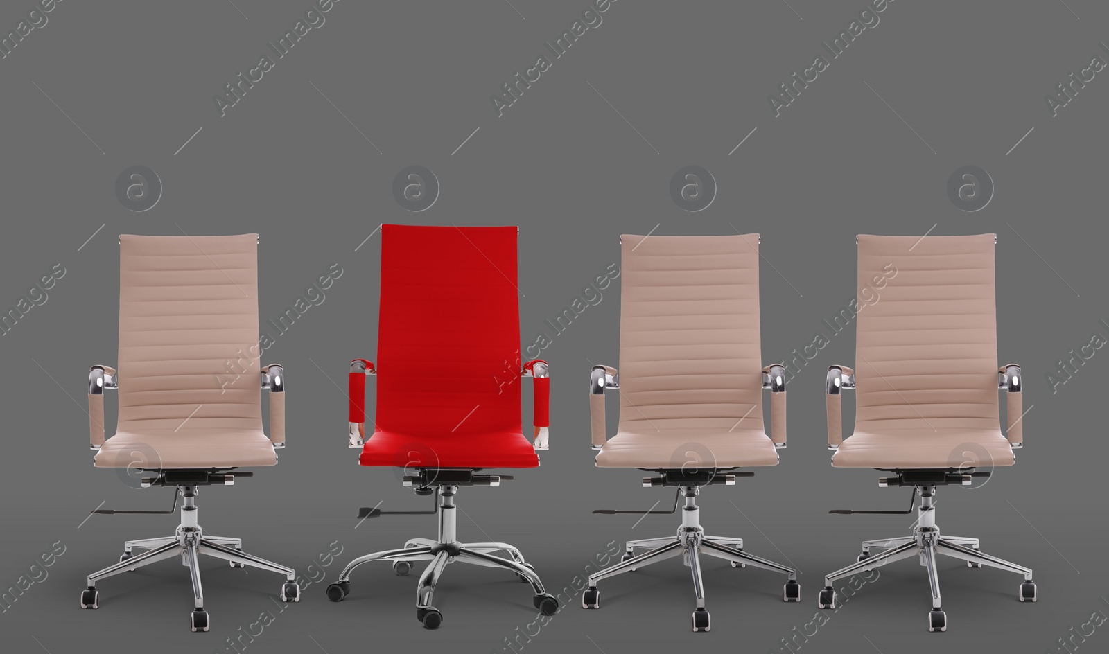 Image of Vacant position. Red office chair among beige ones on grey background