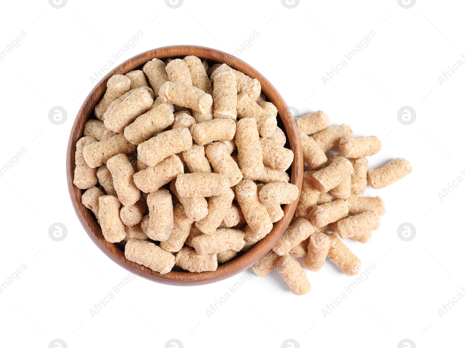 Photo of Granulated wheat bran in bowl on white background, top view
