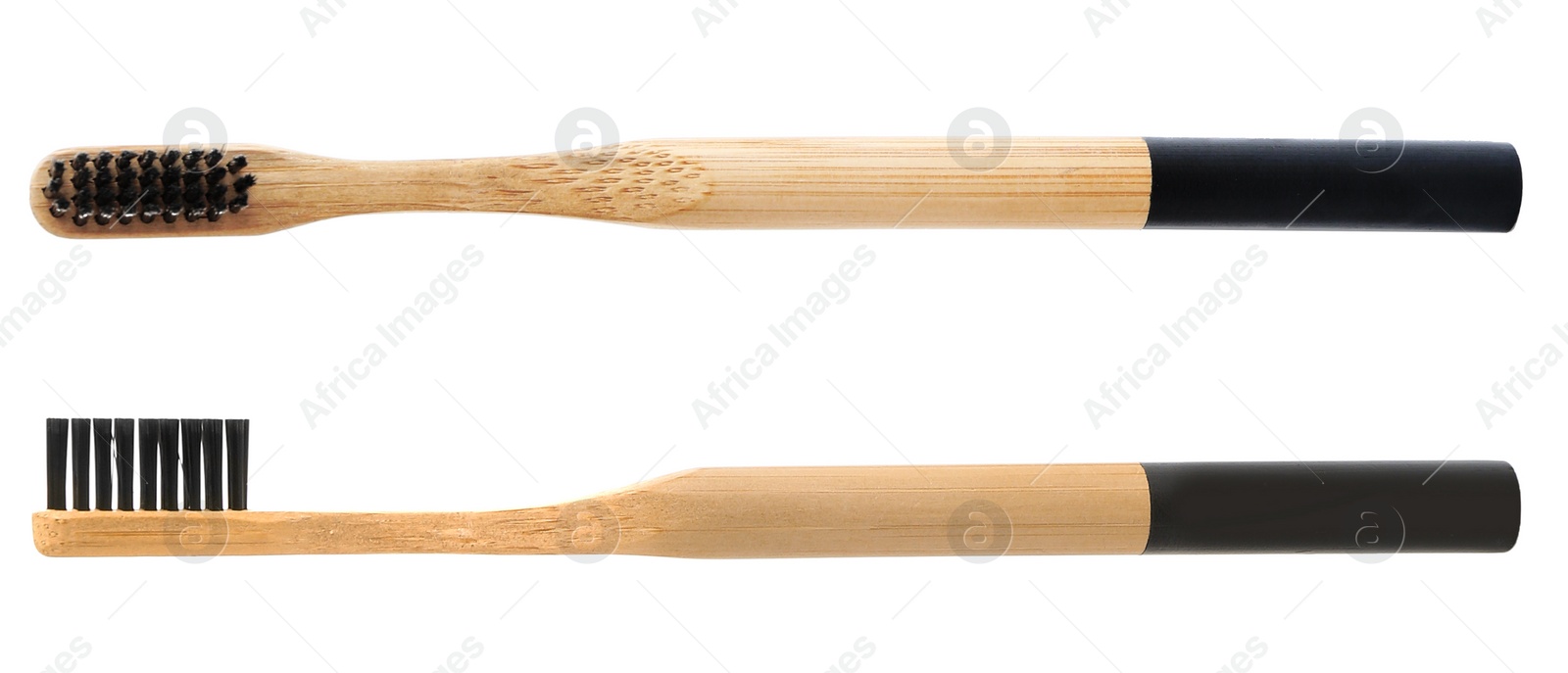 Image of Bamboo toothbrushes with charcoal bristles on white background 