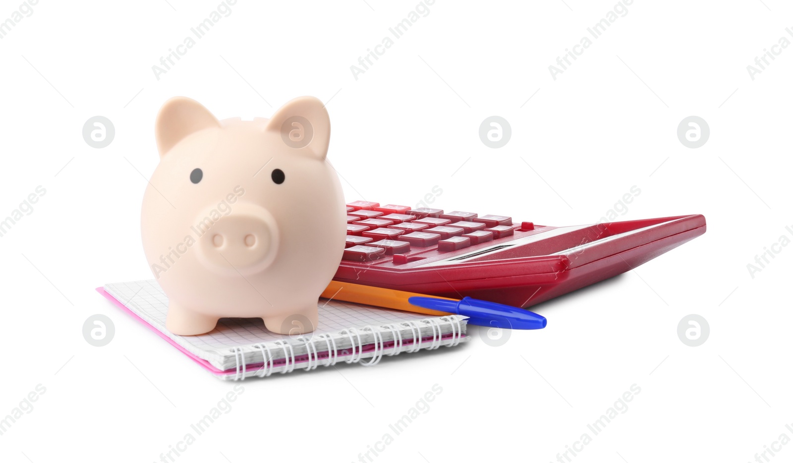 Photo of Calculator, piggy bank, pen and notebook isolated on white