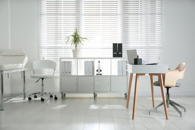 Doctor's office interior with modern workplace in clinic