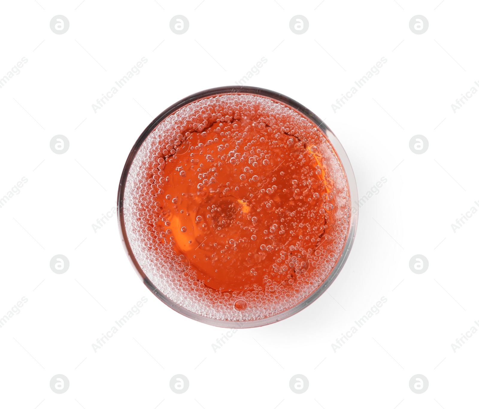 Photo of Glass of rose champagne isolated on white, top view