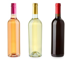 Image of Bottles of white, rose and red wine isolated on white