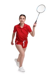 Photo of Young woman playing badminton with racket on white background